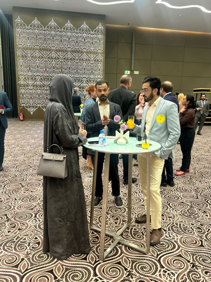 Tejwaans team members exchanging ideas with experienced professionals at Back to Business in Qatar