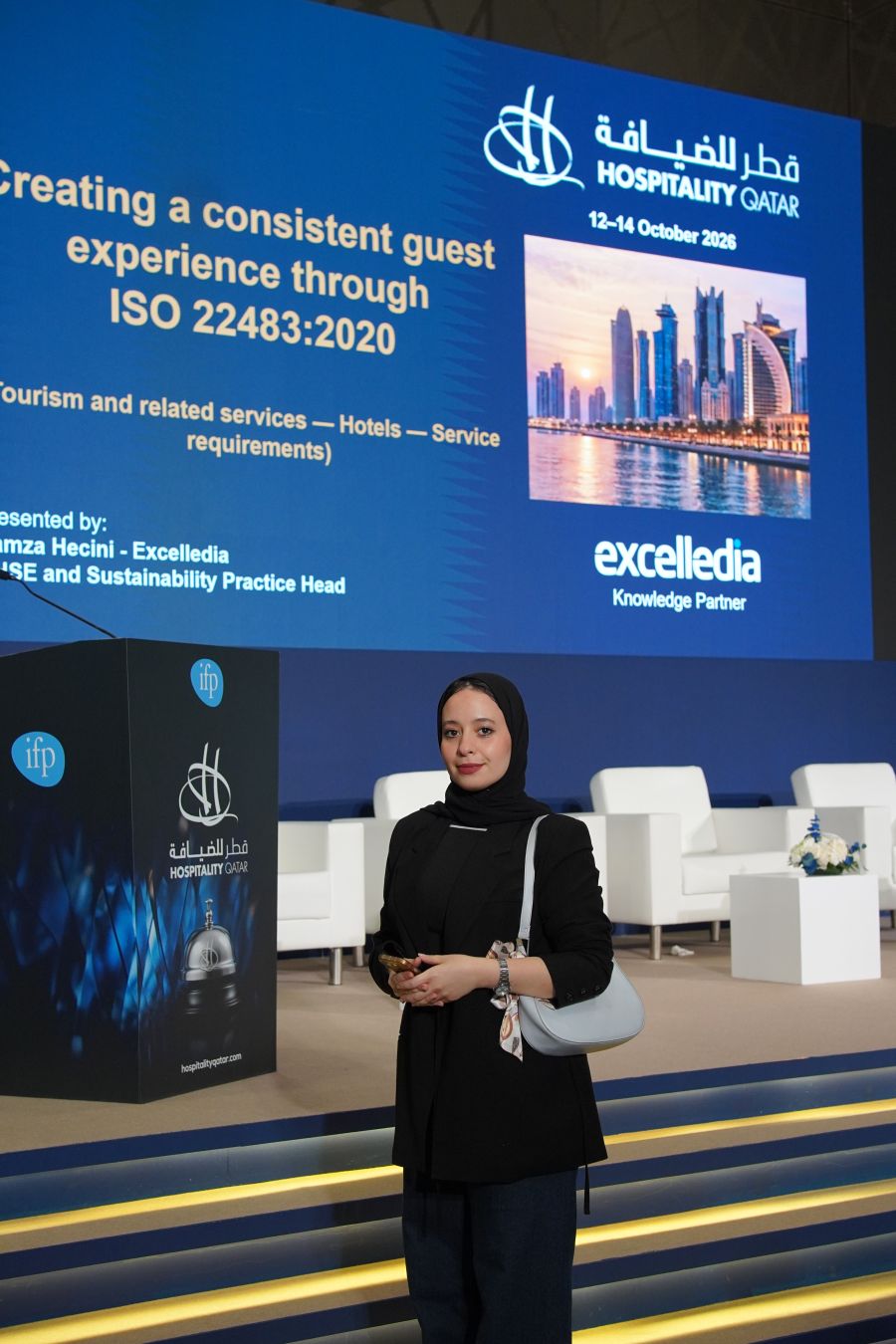 Tejwaans team member at the Hospitality Qatar 2026 seminar stage in Doha